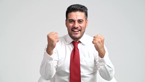 Excited-Businessman-portrait-in-white-background.