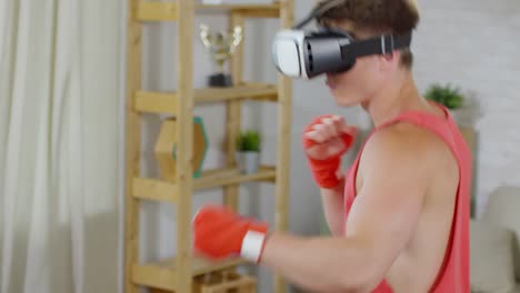 Hombre-usando-VR-gafas-cuando-Shadowboxing