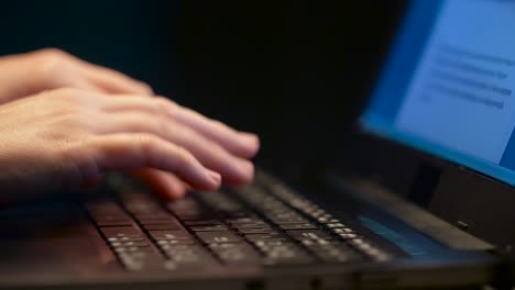 close-up-of-female-hands-with-laptop-typing