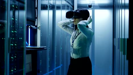 Woman-in-VR-glasses-working-in-data-center