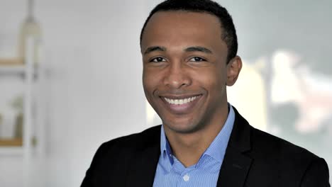 Thumbs-Up-by-Casual-Afro-American-Businessman-Looking-at-Camera