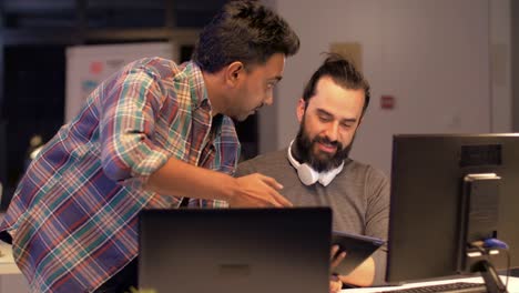 creative-team-with-computers-works-at-night-office