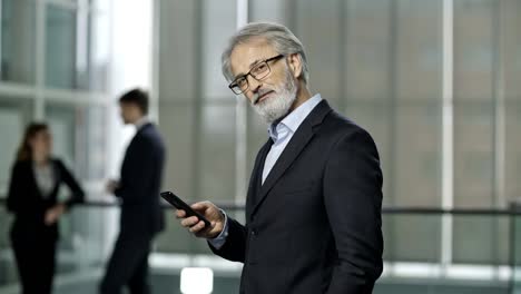 handsome-senior-business-man--in-a-corporate-setting