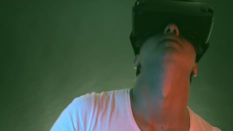 Young-Man-Wearing-VR-Headset-And-Experiencing-Virtual-Reality