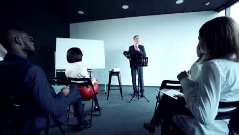 Businessman-doing-presentation-of-vr-helmet