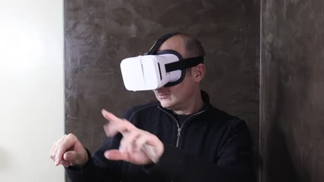 man-with-VR-goggles-navigating-menus