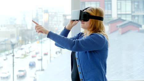 Woman-using-virtual-reality-headset