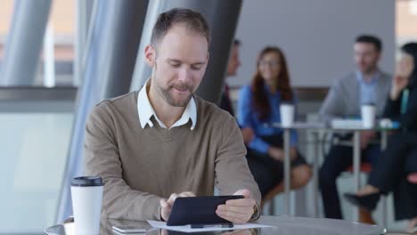 Businessman-using-tablet