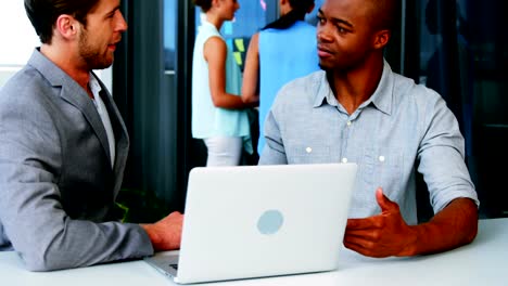 Business-executives-shaking-hands-with-each-other