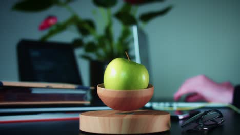 4K-Levitation-Device-with-Apple-in-Corporate-Office