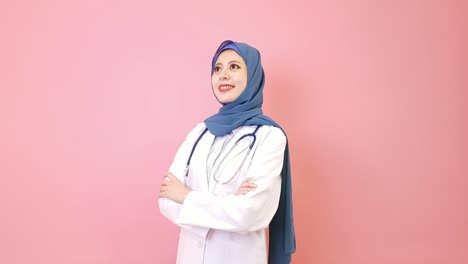 smiling-young-muslim-woman-doctor-hands-crossed