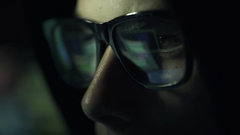 Hacker-with-glasses-connecting-online-and-stealing-data