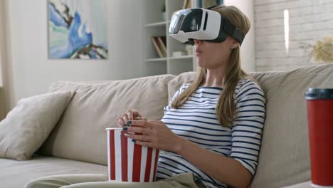 Woman-Enjoying-Movie-in-VR-Goggles