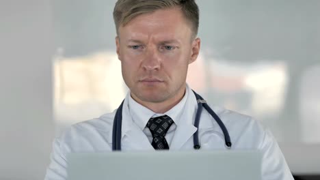 Doctor-Working-On-Laptop