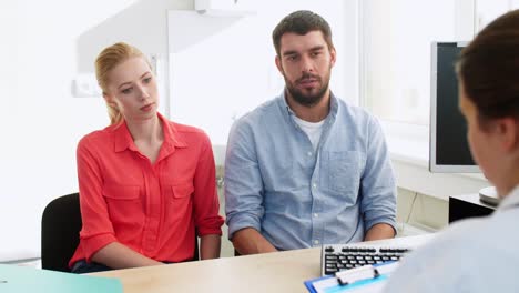 couple-visiting-doctor-at-family-planning-clinic