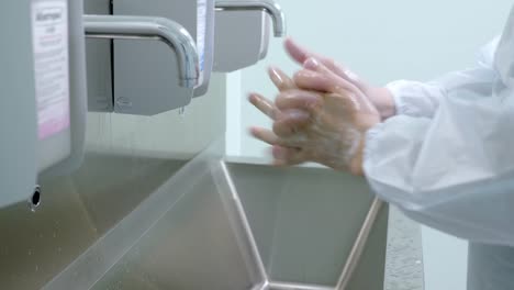 The-doctor-washes-his-hands,-disinfect-their-hands-before-surgery.