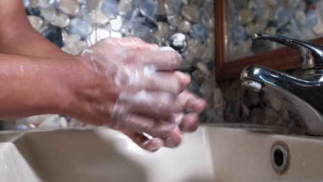 Washing-hands-rubbing-with-soap-man-for-corona-virus-prevention