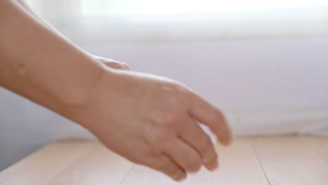 Closeup-Man-Using-Bottle-of-Antibacterial-Wash-Hand-Sanitizer