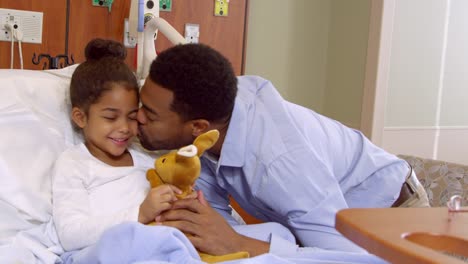 Father-And-Child-Play-With-Soft-Toy-In-Hospital-Shot-On-R3D