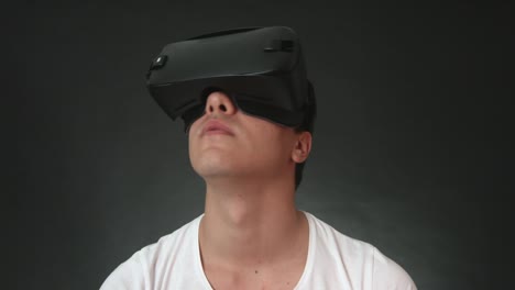 Young-Man-Wearing-VR-Headset-And-Experiencing-Virtual-Reality