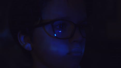 4k-Abstract-Shot-of-a-Child-Face-with-Projector-Reflection-of-Scan