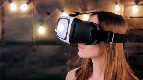 Young-woman-using-Virtual-Reality-Glasses