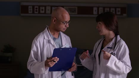 Two-doctors-have-discussion-at-hospital