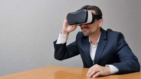 Man-dresses-virtual-reality-glasses