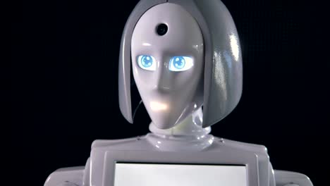 A-white-female-robot-moving-its-eyes.