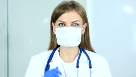 Close-Up-of-Doctor-Wearing-Mask-in-Clinic