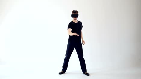 360-VR-gaming-concept,-A-man-wearing-VR-headset-moving-his-hands.