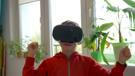 Video-of-boy-exploring-virtual-reality-and-winning-game-in-4k