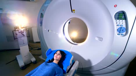 Woman-on-a-magnetic-resonance-imaging-MRI-scan-in-a-modern-hospital.