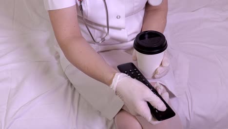 Nurse-using-remote-control