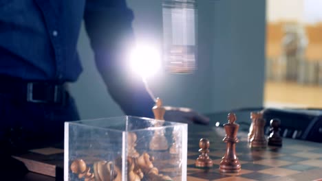Game-close-up-view-between-chess-player-and-robot.