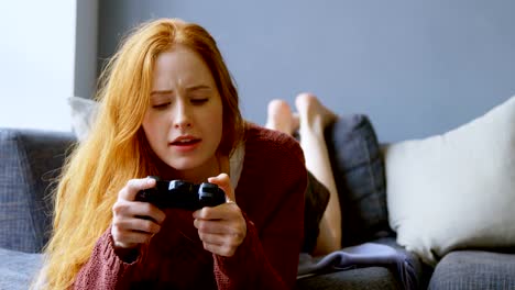 Woman-playing-video-games-in-living-room-4k