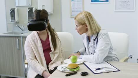 Doctor-Talking-to-Girl-in-VR-Headset