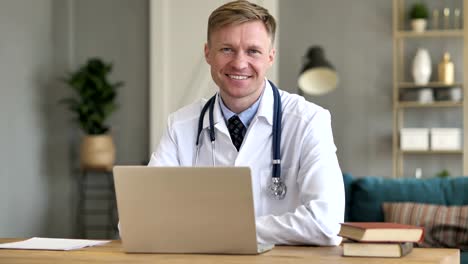 Smiling-Positive-Doctor-At-Work-Looking-at-Camera