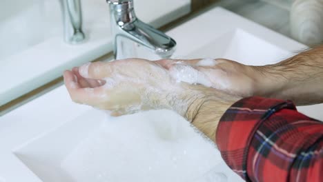 Wash-off-dirt-from-hands,wash-hands-thoroughly-with-soap,body-hygiene-and-cleanliness.Prevention-of-germs-on-hands,close-up