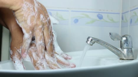 washing-hands-with-soap-close-up-shot