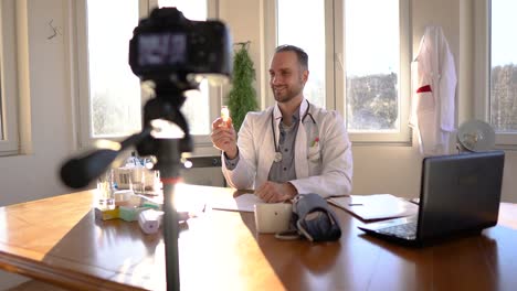 Doctor-giving-online-consultation-to-patient-by-video-call-from-his-office-about-COVID-19-prevention