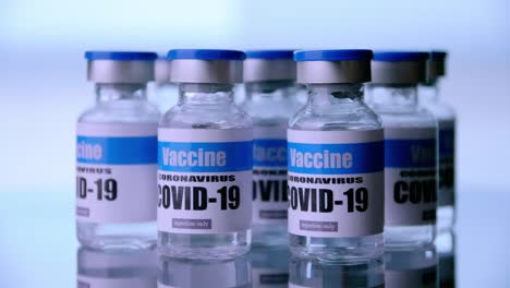 Glass-vials-for-Covid-19-vaccine-in-laboratory.-Group-of-Coronavirus-vaccine-bottles.-Medicine-in-ampoules.