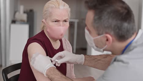 Senior-Woman-Getting-Flu-Shot