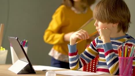 Distance-education-of-children-at-home-during-the-quarantine-period-for-covid19-coronavirus.-Close-up-view.