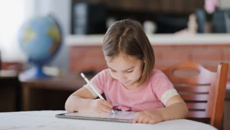 Little-Child-Girl-Drawing-On-Digital-Tablet-Using-Digitized-Pen