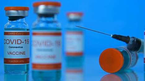 Covid-19-Coronavirus-Vaccine-And-Syringe-Injection