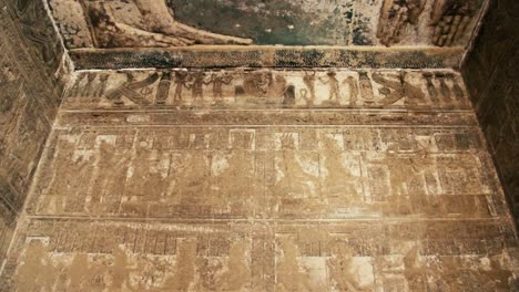 Beautiful-interior-of-the-temple-of-Dendera-or-the-Temple-of-Hathor.-Image-of-the-ancient-goddess-of-the-sky-Nut-on-the-ceiling-of-the-ancient-Egyptian-temple.-Egypt,-Dendera,-near-the-city-of-Ken