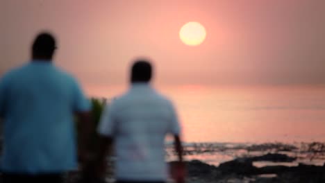 Two-men-walking-in-the-sunset