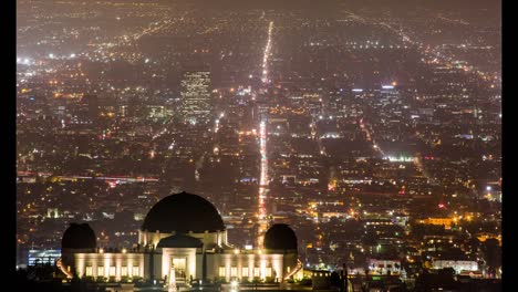 Parque-y-observatorio-Griffith-y-largo-de-las-calles-de-la-ciudad-de-Los-Ángeles-por-la-noche-:-Lapso-de-tiempo