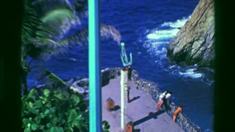 1978:-Famous-cliff-diving-rocks-of-La-Quebrada-monument-statue-zoom.